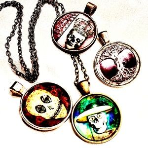 FOUR Candy skull pendants with one matching chain. Ch  as age them up❣️